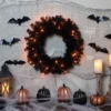 Northlight Pre-Lit Black Noble Spruce Artificial Halloween Wreath, 24-Inch, Orange Lights