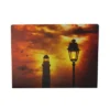 Northlight LED Lighted Lighthouse And Lantern Lamp Post With Amber Sky Canvas Wall Art 15.75" X 11.75"